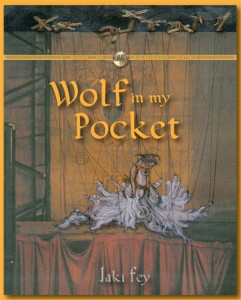 A little girl on a stage is hooked up like a marionette; the title in gold says, Wolf In My Pocket